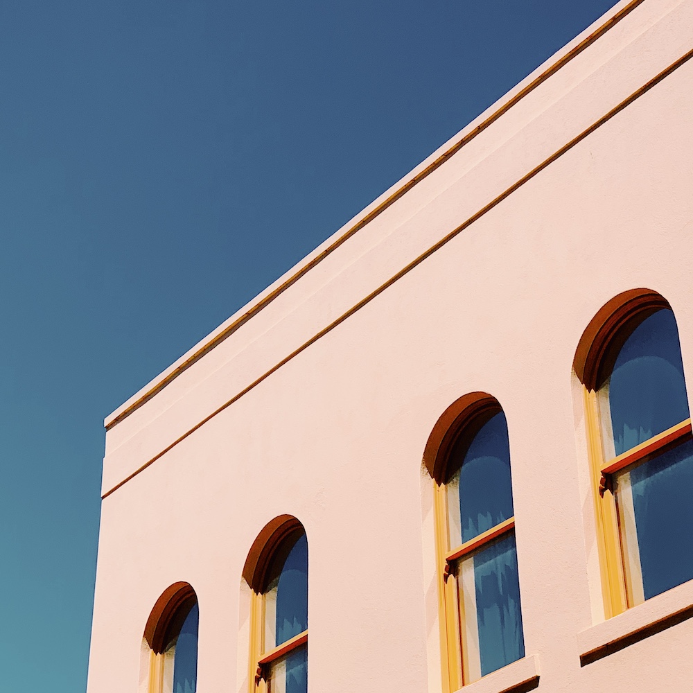 Closeup shot of a white building with windows
